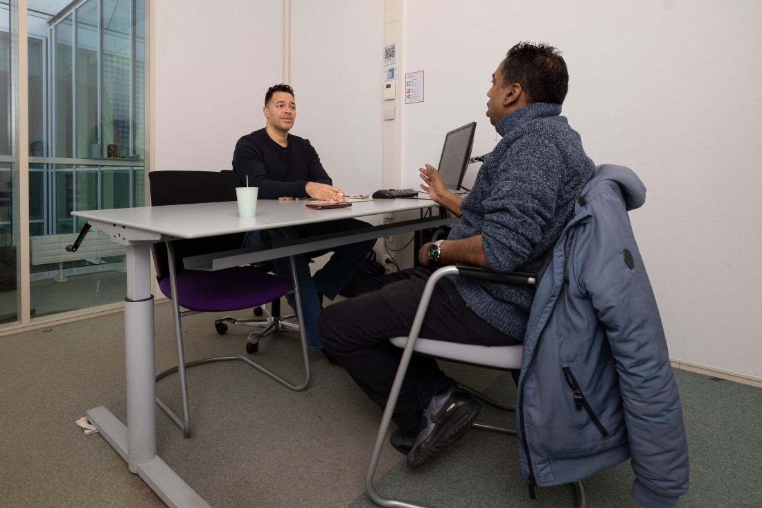 Gesprek schuldhulpverlener